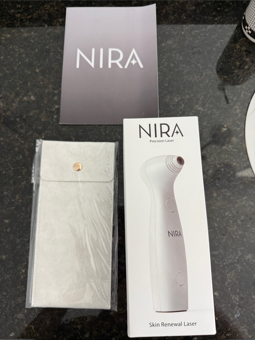 Nira Precision Laser - Brand New, Sealed with soft cloth case and booklet
